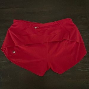 Red lululemon speed up 2.5” inseam shorts
